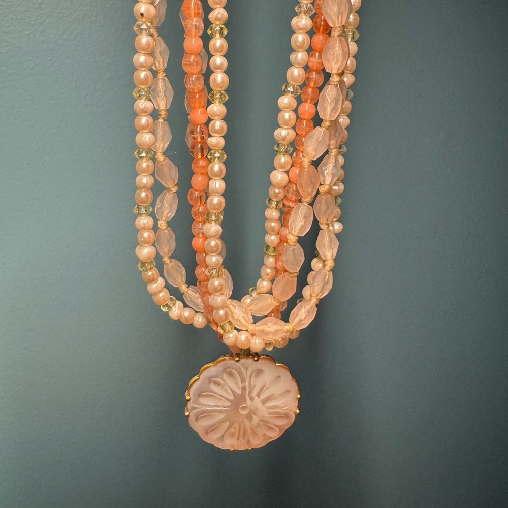 Coral and white beaded necklace